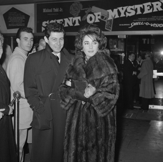 Elizabeth Taylor and husband Eddie Fisher at the Scent Of Mystery premiere