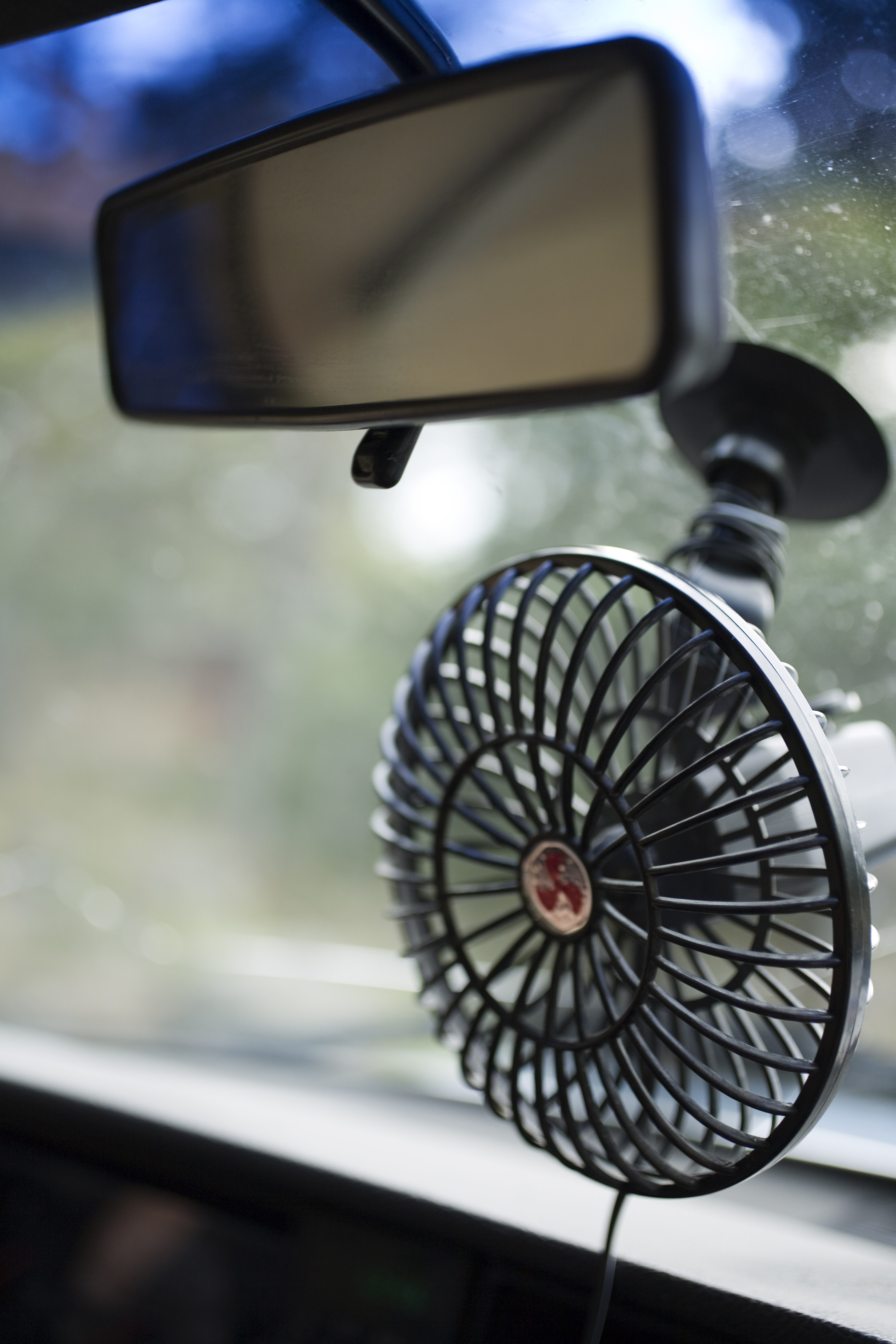 The suction tabs on the back of the fan allow it to be stuck almost anywhere in the car