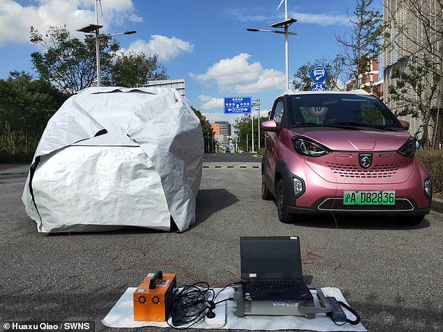 The cloak is the brainchild of researchers from Shanghai Jiao Tong University, and is designed to keep electric cars cool in the summer and warm in the winter