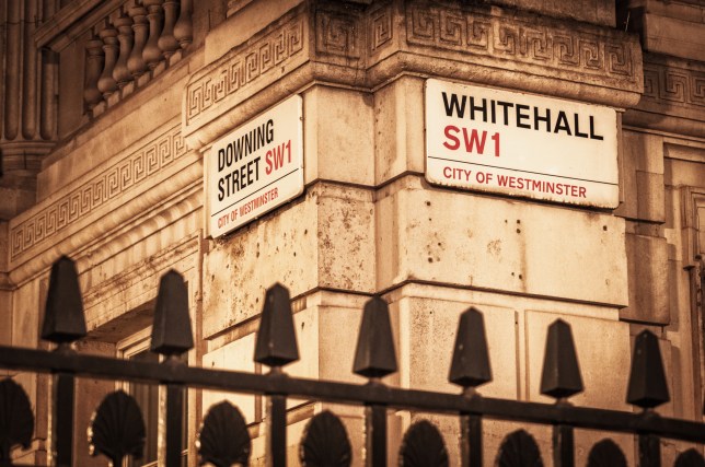 Downing Street and Whitehall signs at night