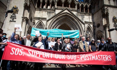 Post Office workers celebrate with their supporters outside the Royal Courts of Justice in London in April 2021.