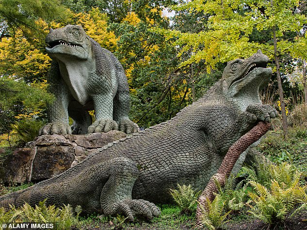 The dinosaur sculptures in Crystal Palace were created in 1854 and are the first full-scale representations of the dinosaurs. Pictured here are the iguanodon (right) and megalosaurus (left)