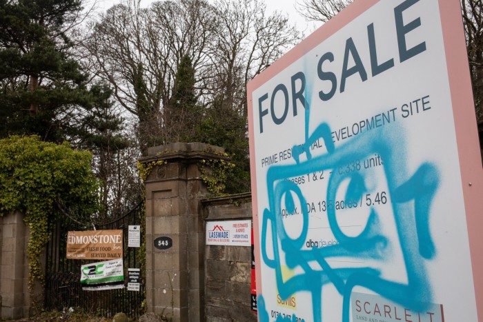 A graffitied sign on land at Edmonstone in south-east Edinburgh owned by Michael James Burke 