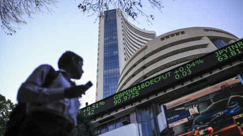 An electronic ticker board indicates British pound to Indian rupee currency exchange rate outside the Bombay Stock Exchange (BSE) building in Mumbai, India, on Tuesday, Dec. 11, 2018. Urjit Patel’s shock exit as governor of the Reserve Bank of India roiled financial markets already nervous about early election results showing Prime Minister Narendra Modi’s ruling party losing support in key states. Photographer: Dhiraj Singh/Bloomber
