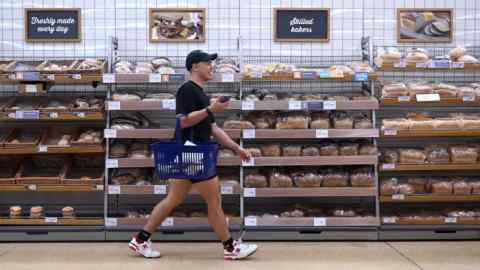 A man shops at a supermarket in London