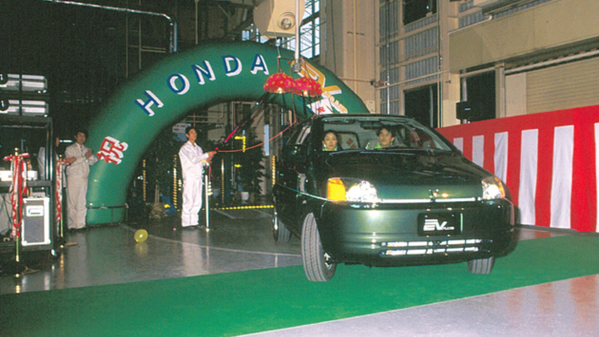 Honda EV Plus in showroom.